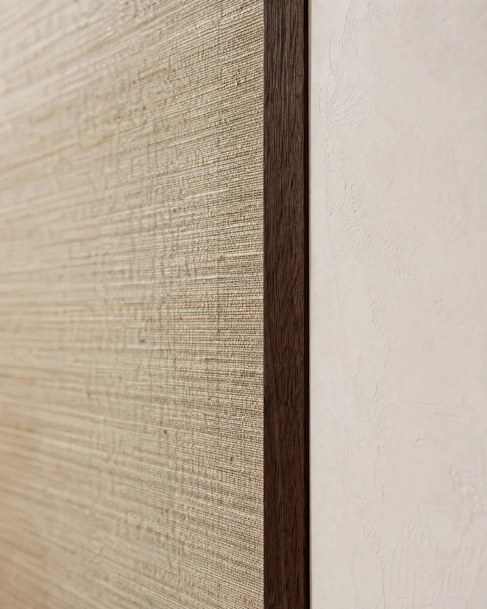 Grasscloth wallpaper installation detail by Canvas Design Atelier